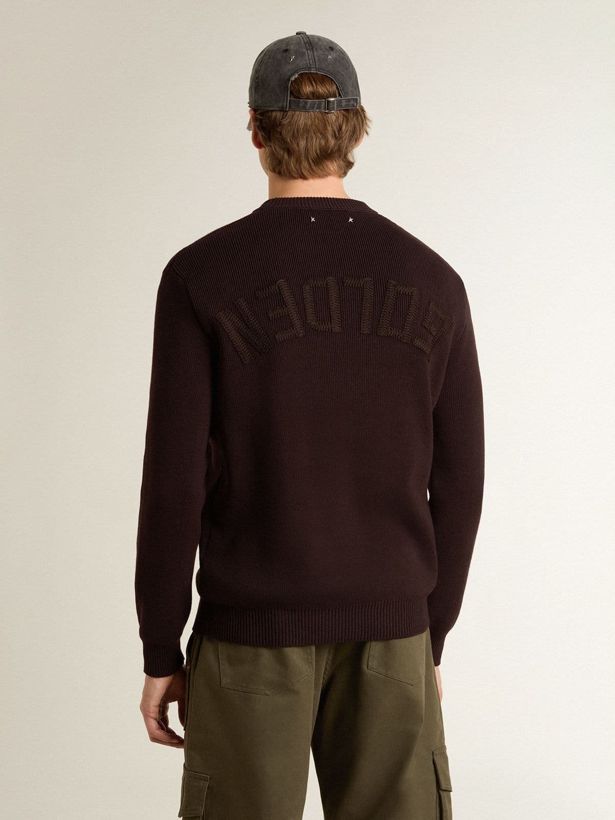 Men's brown crew-neck sweater with 'Golden' lettering on the back