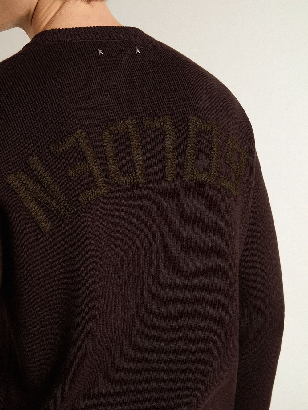 Men's brown crew-neck sweater with 'Golden' lettering on the back