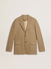 Men's single-breasted blazer in a sand-colored chevron linen blend.