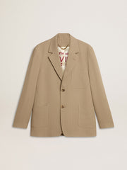 Men's beige pinstripe single-breasted jacket with an oversized fit