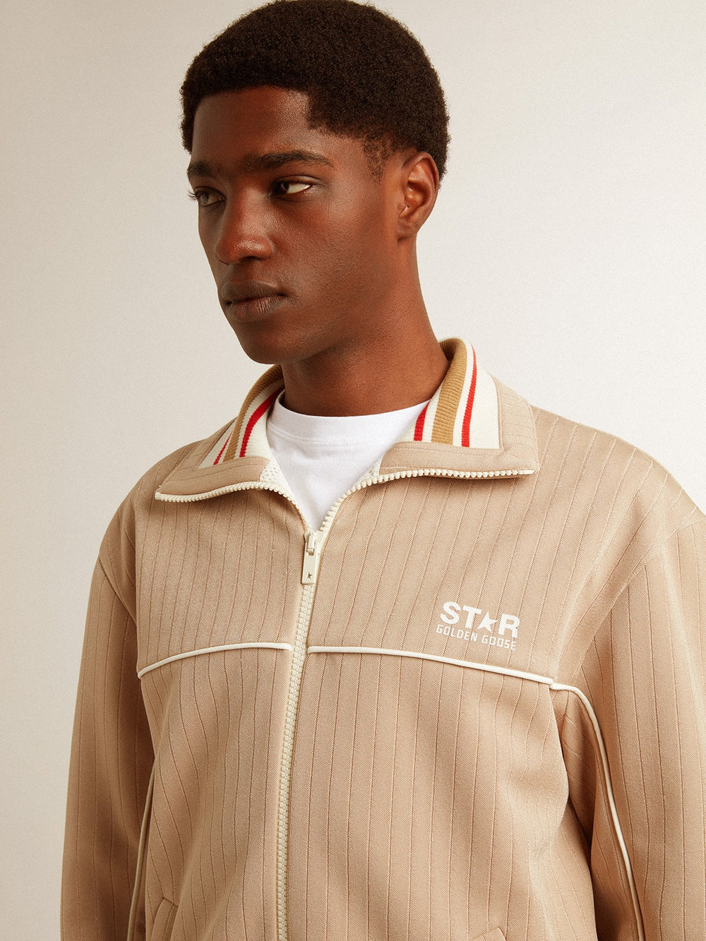 Men’s light beige zipped sweatshirt with white logo