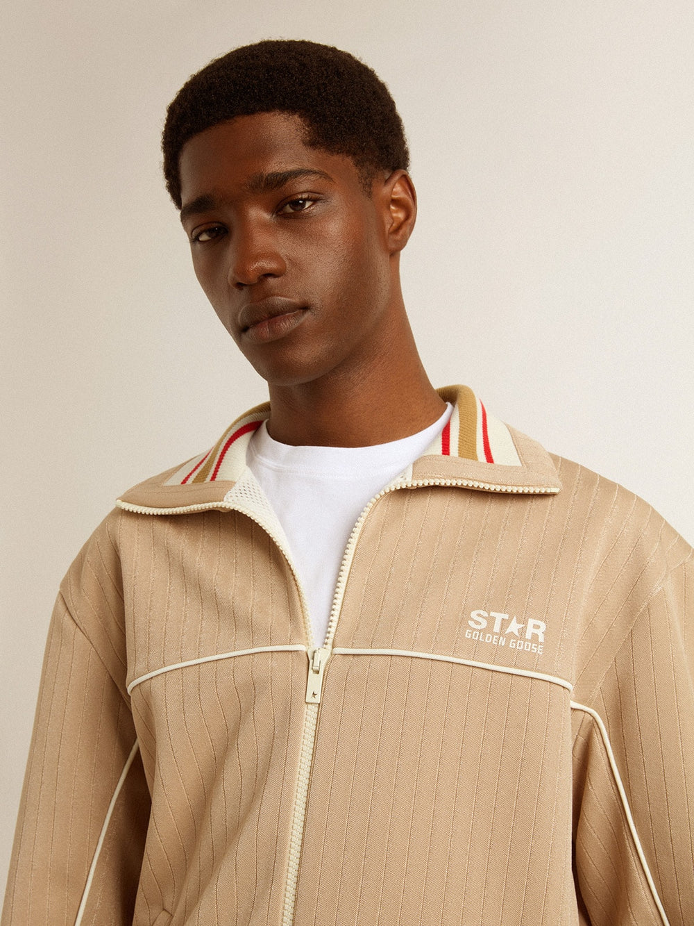 Men’s light beige zipped sweatshirt with white logo