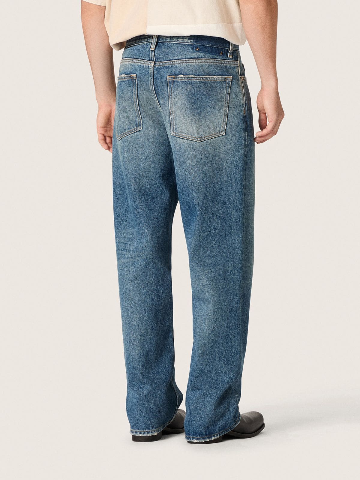 Blue medium wash loose jeans