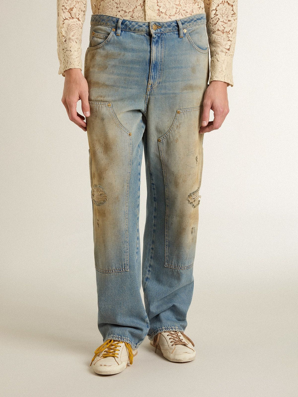 Men's distressed sand-washed jeans