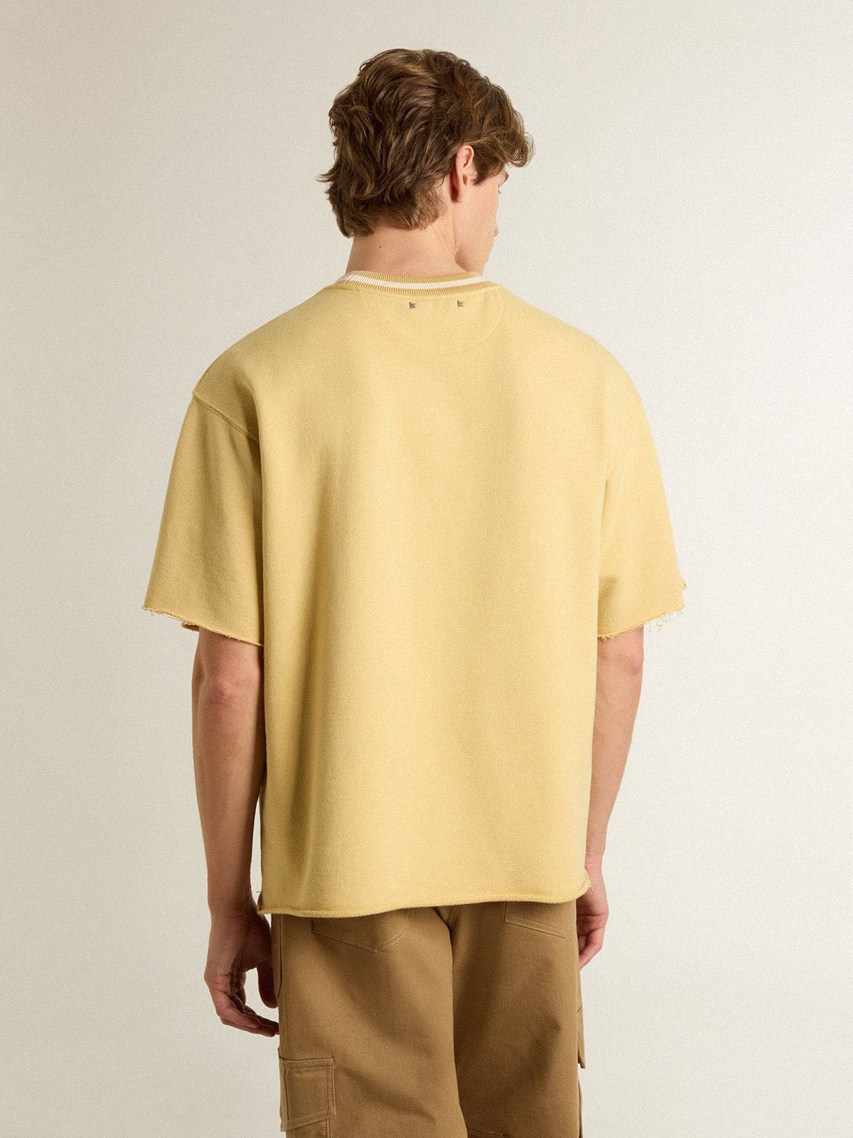 Men's oversized yellow cotton T-shirt with blue print