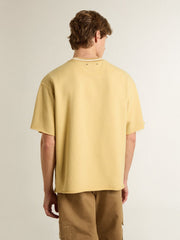 Men's oversized yellow cotton T-shirt with blue print