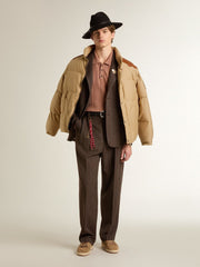 Men's brick-colored polo with embroidered logo.