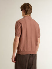 Men's brick-colored polo with embroidered logo.