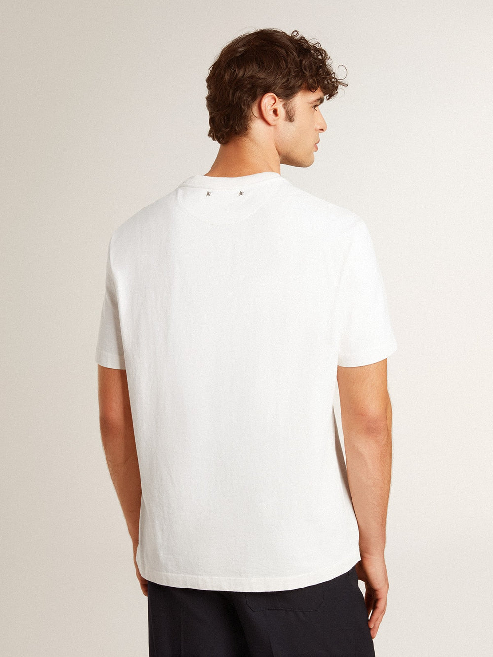 Men's worn-white cotton T-shirt with black lettering