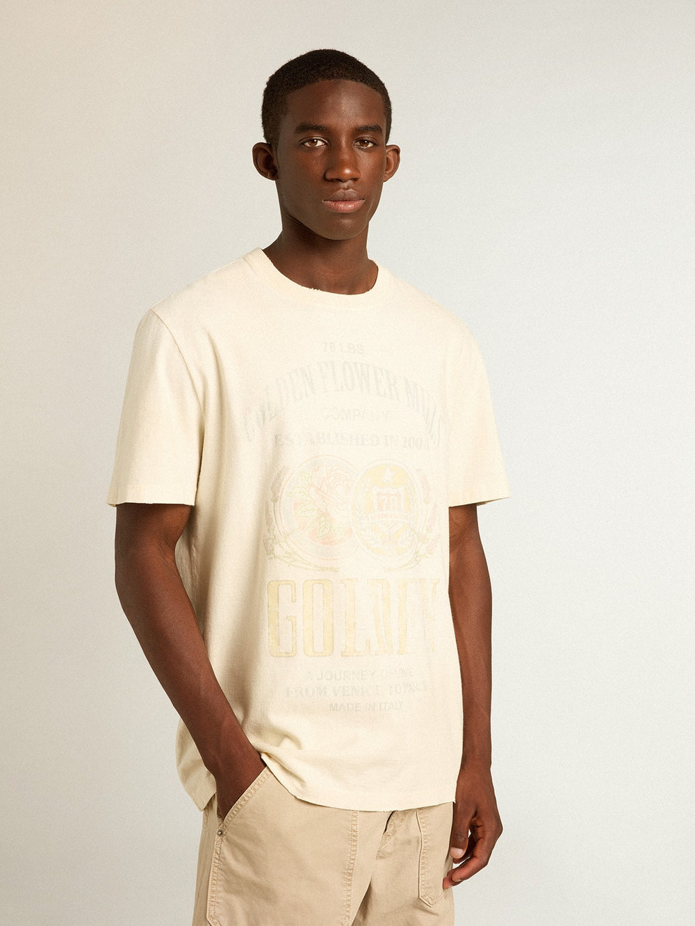 Men’s aged white cotton T-shirt with print on the front