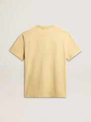 Men's cotton T-shirt in pale yellow with faded lettering