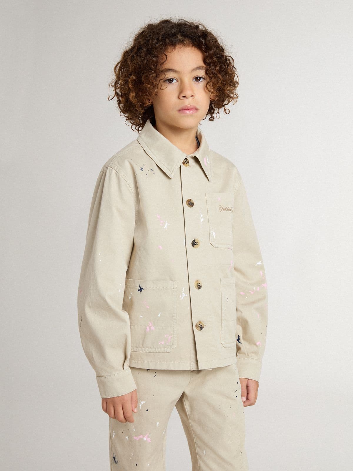 Kids’ beige jacket with multicolor splashes
