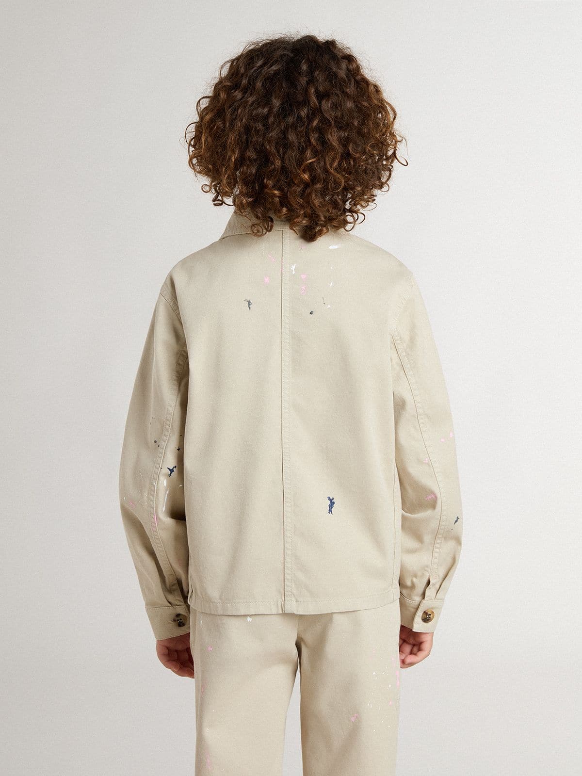 Kids’ beige jacket with multicolor splashes