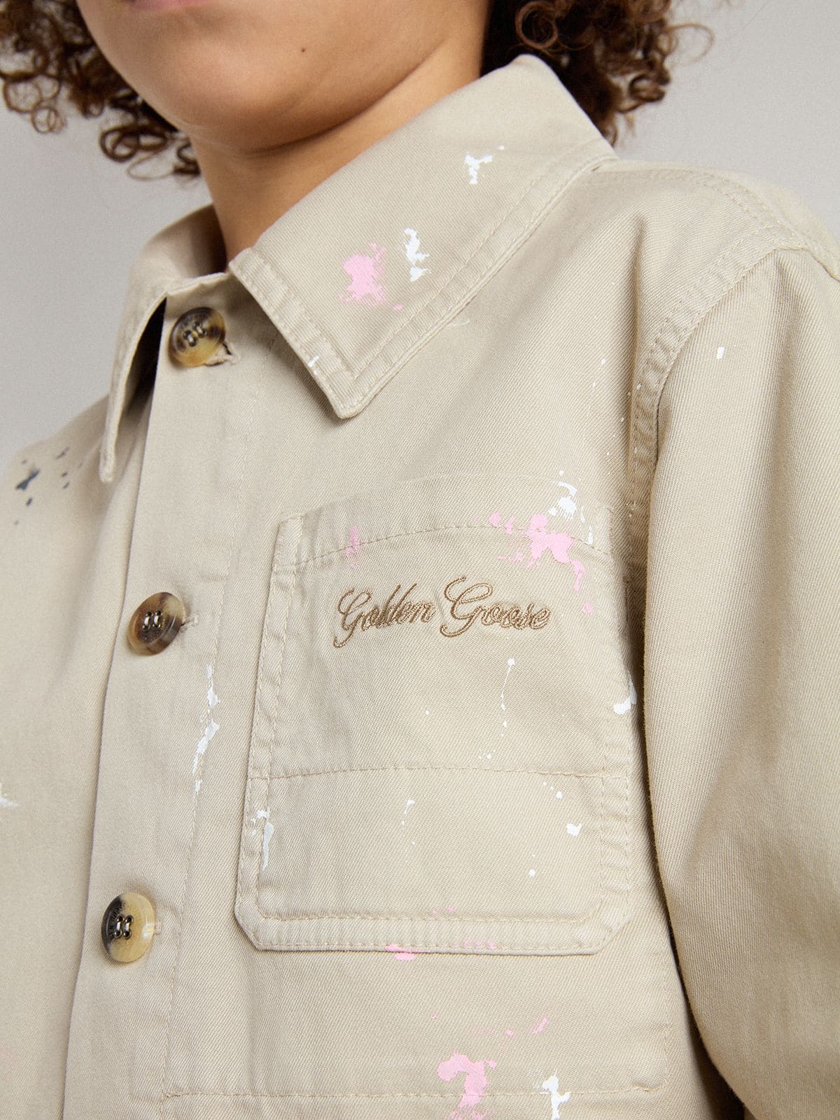 Kids’ beige jacket with multicolor splashes