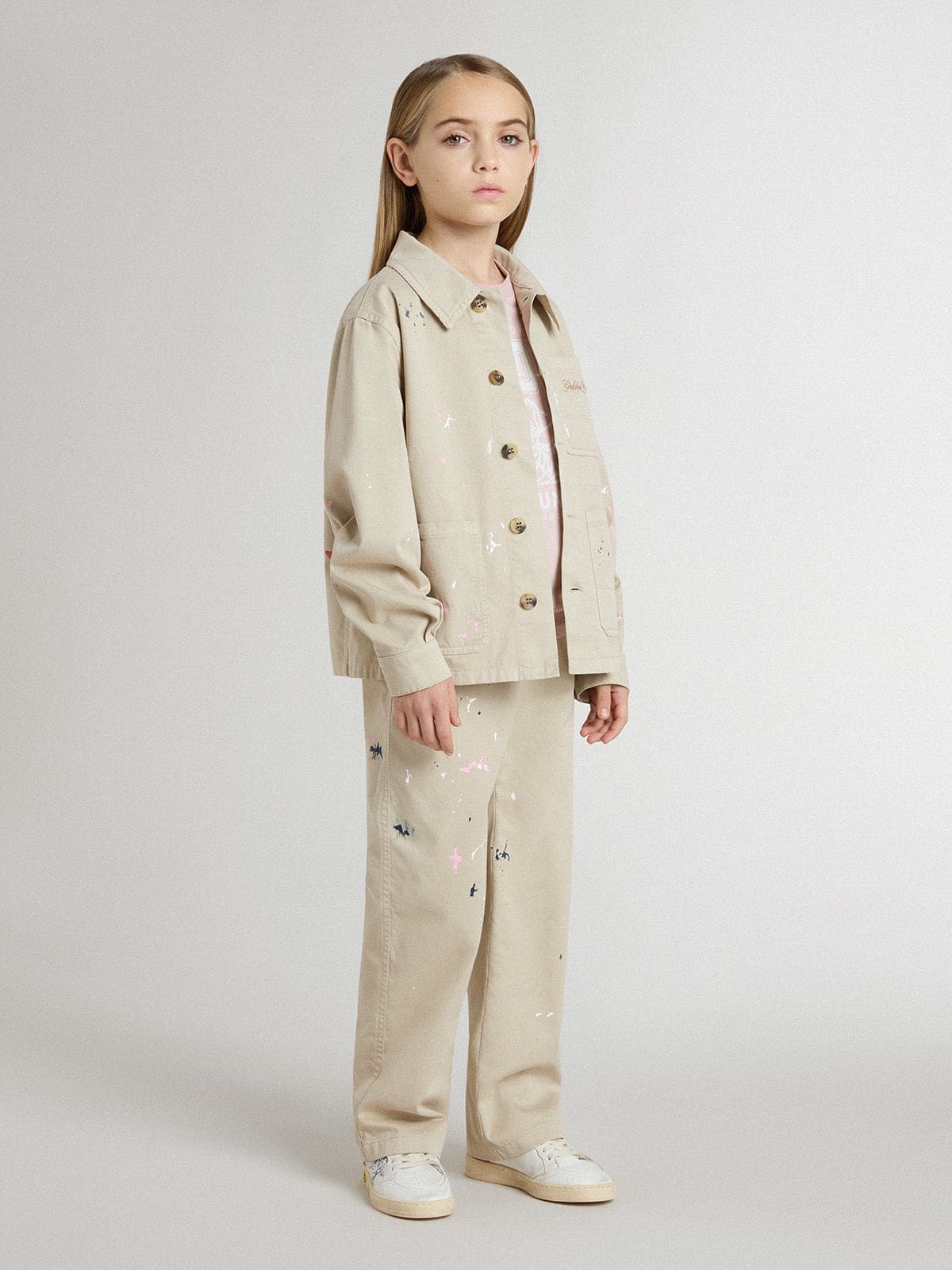 Kids’ beige jacket with multicolor splashes