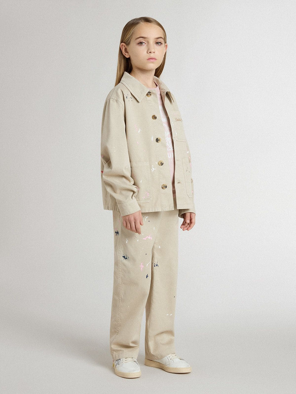 Kids’ beige jacket with multicolor splashes