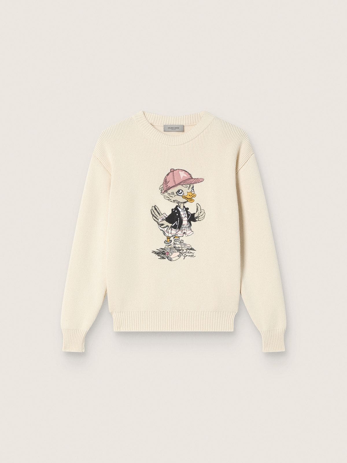 Golden girls’ sweater in white cotton yarn with mascot embroidery