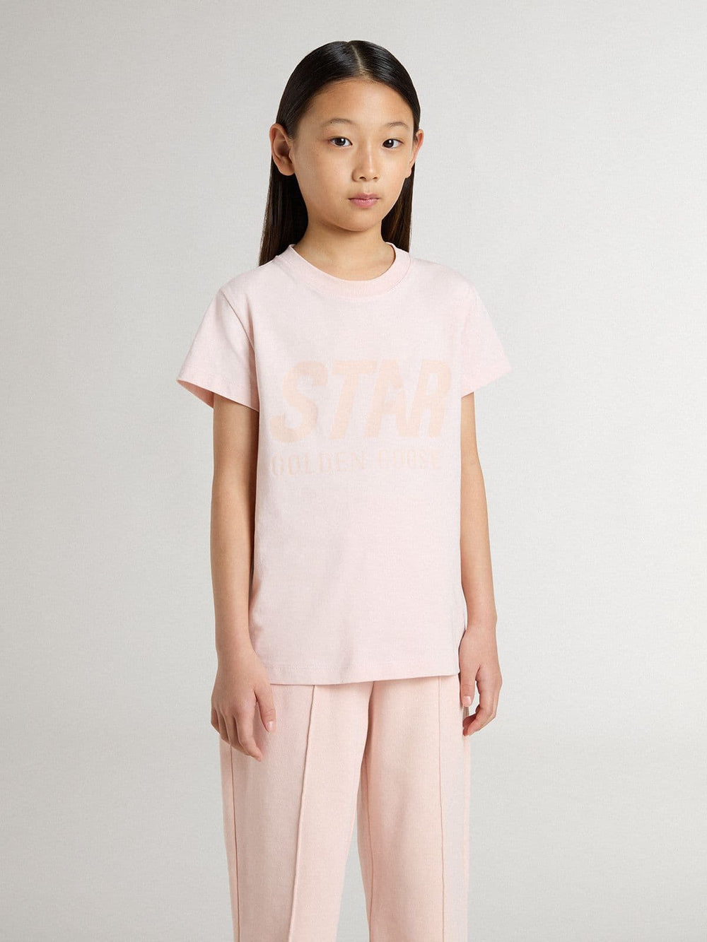 Girls' pink T-shirt with pink print on the front