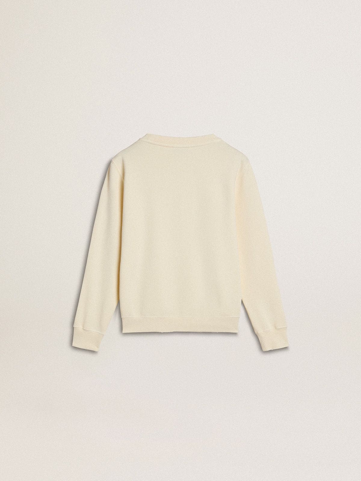Girls’ cream-colored sweatshirt with patch writing