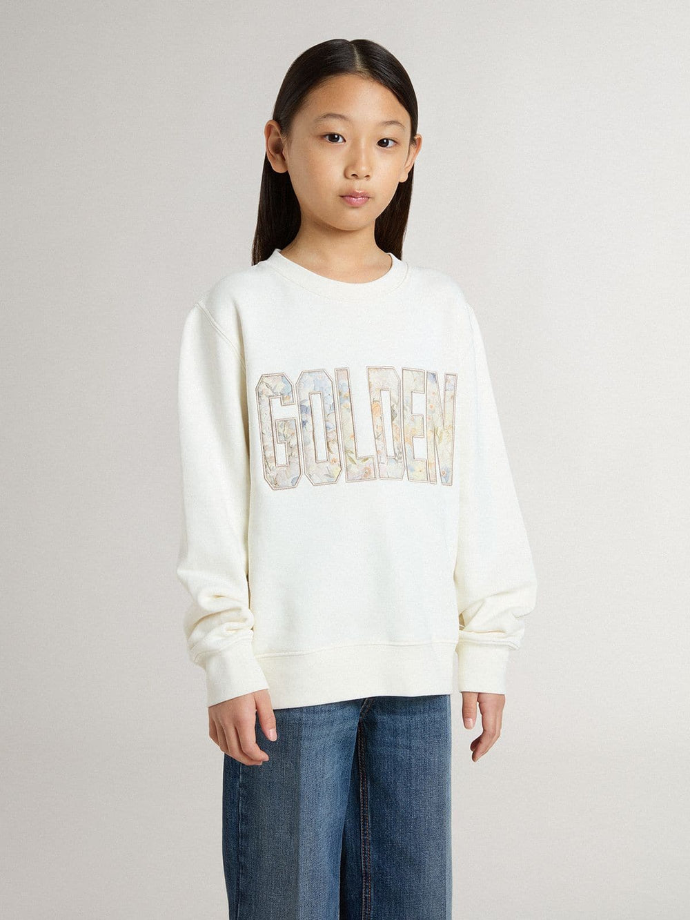 Girls' white sweatshirt with multicolor Golden writing on the front