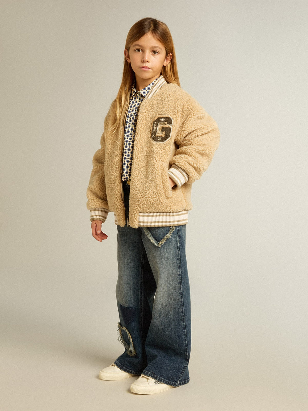 Girls' polo shirt with geometric print