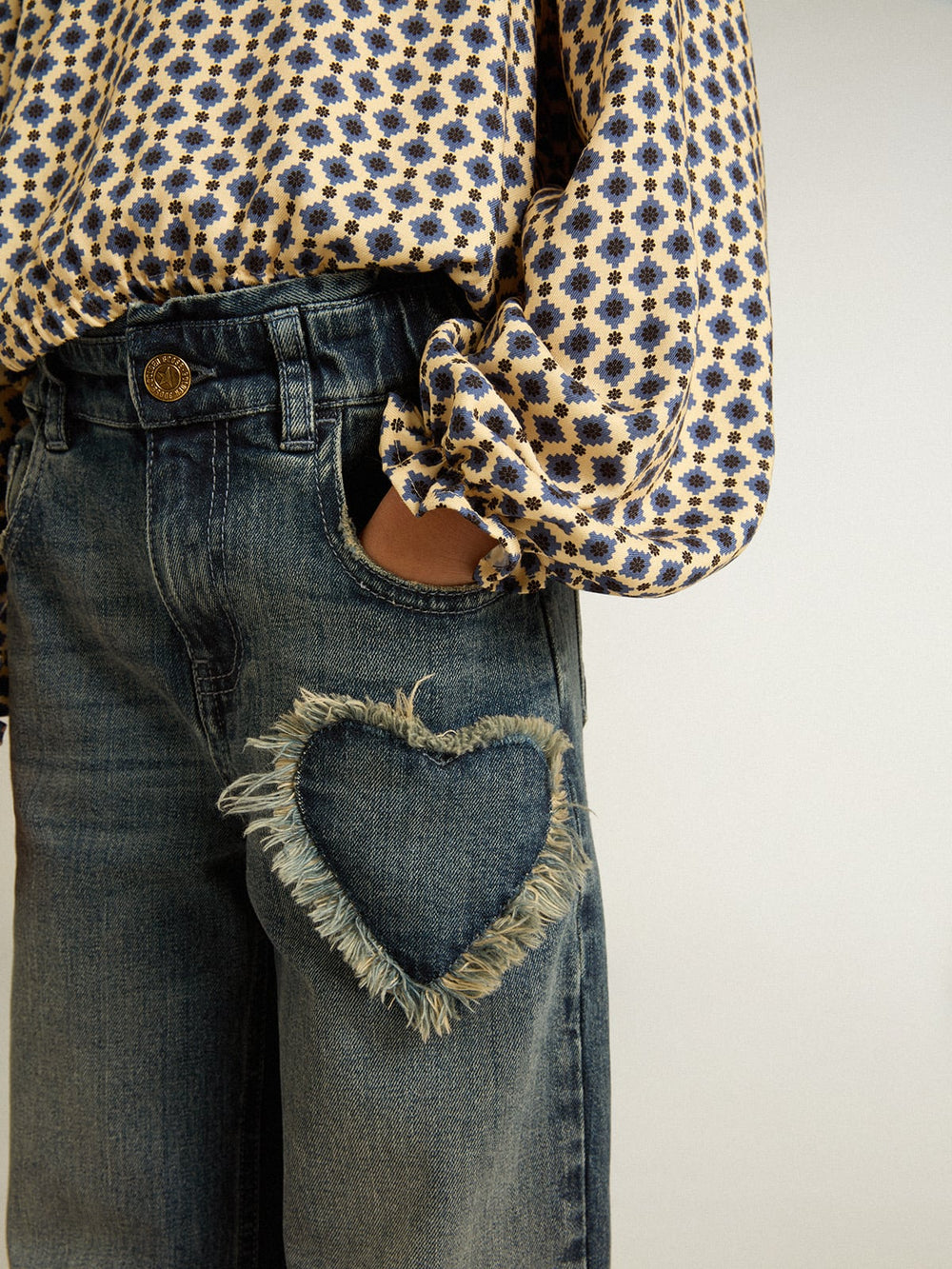 Girls' polo shirt with geometric print