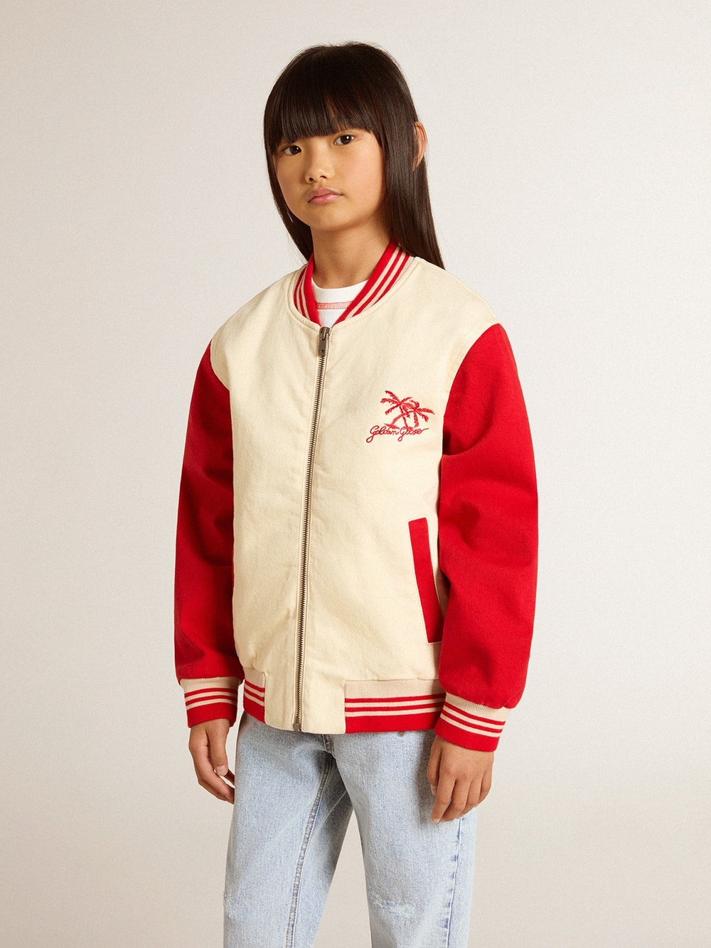 Kids' bomber jacket in beige and red cotton with embroidery on the chest