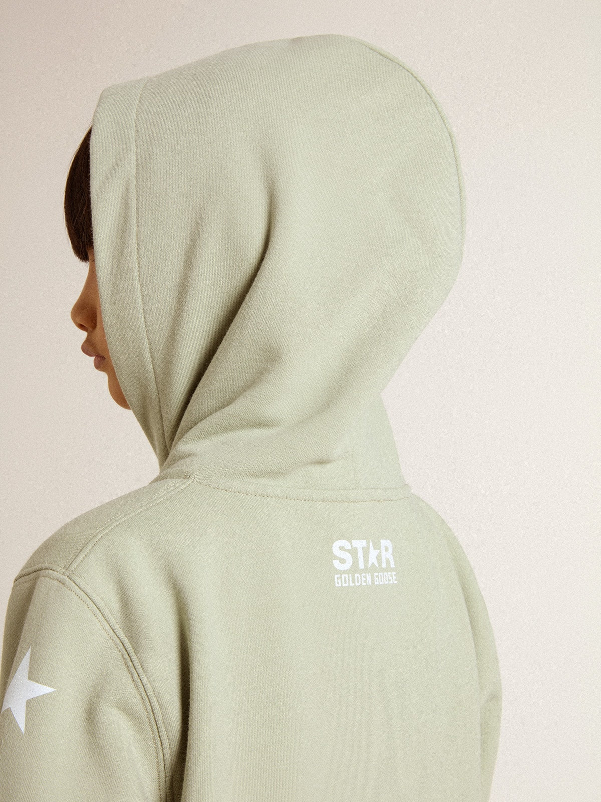 Light green sweatshirt with zip fastening
