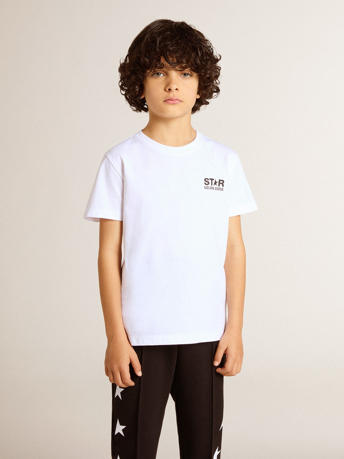 White T-shirt with contrasting black logo and star