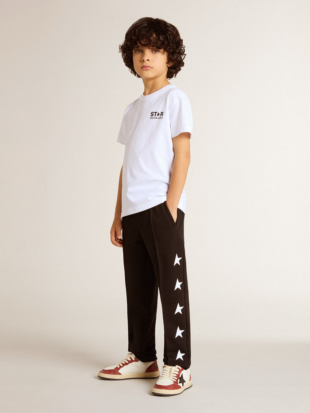 White T-shirt with contrasting black logo and star