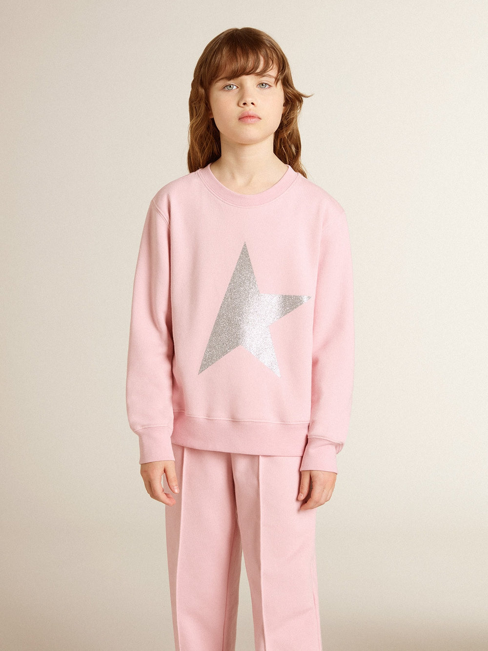 Pink sweatshirt with maxi star in silver glitter on the front