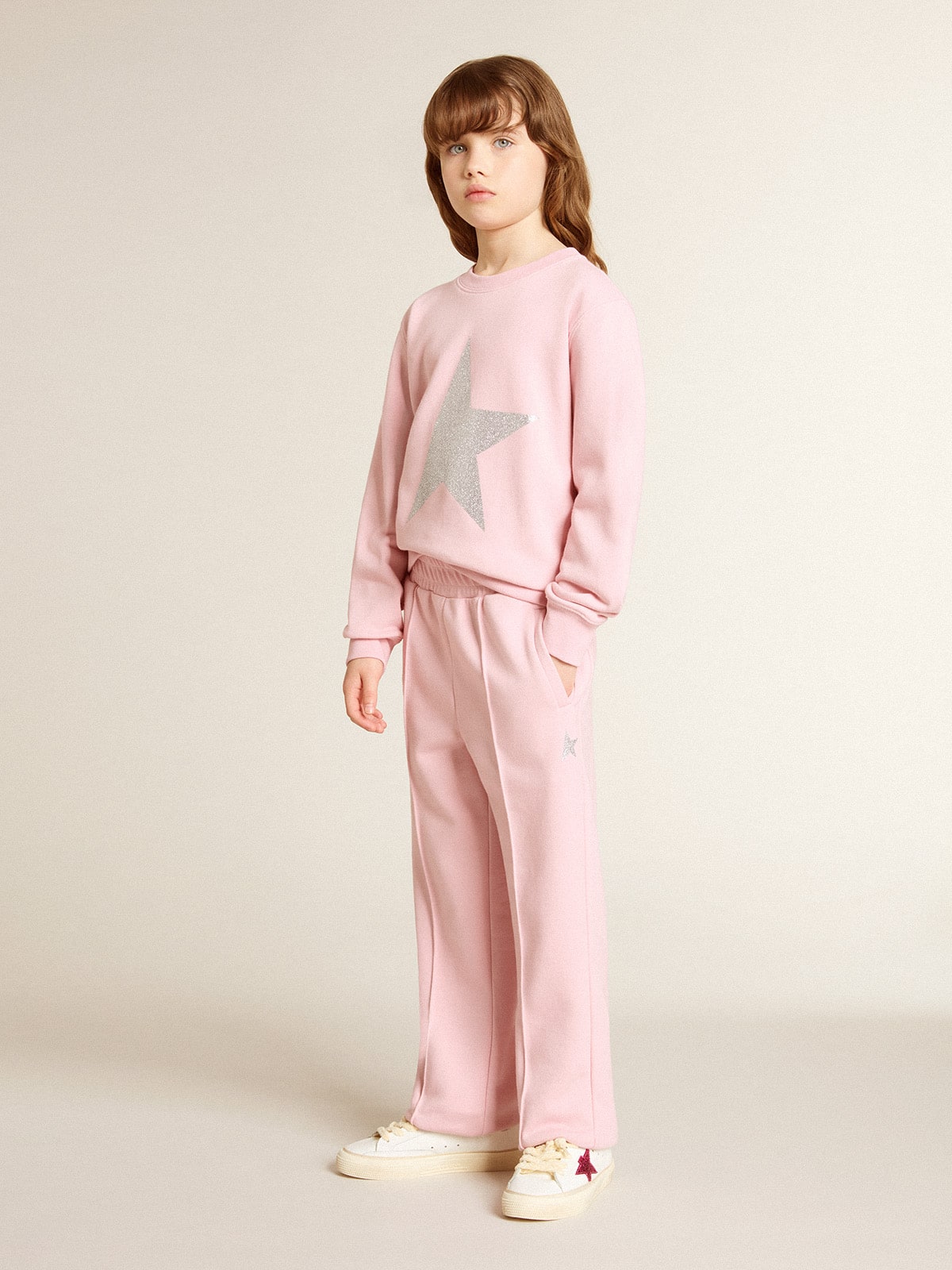 Pink sweatshirt with maxi star in silver glitter on the front