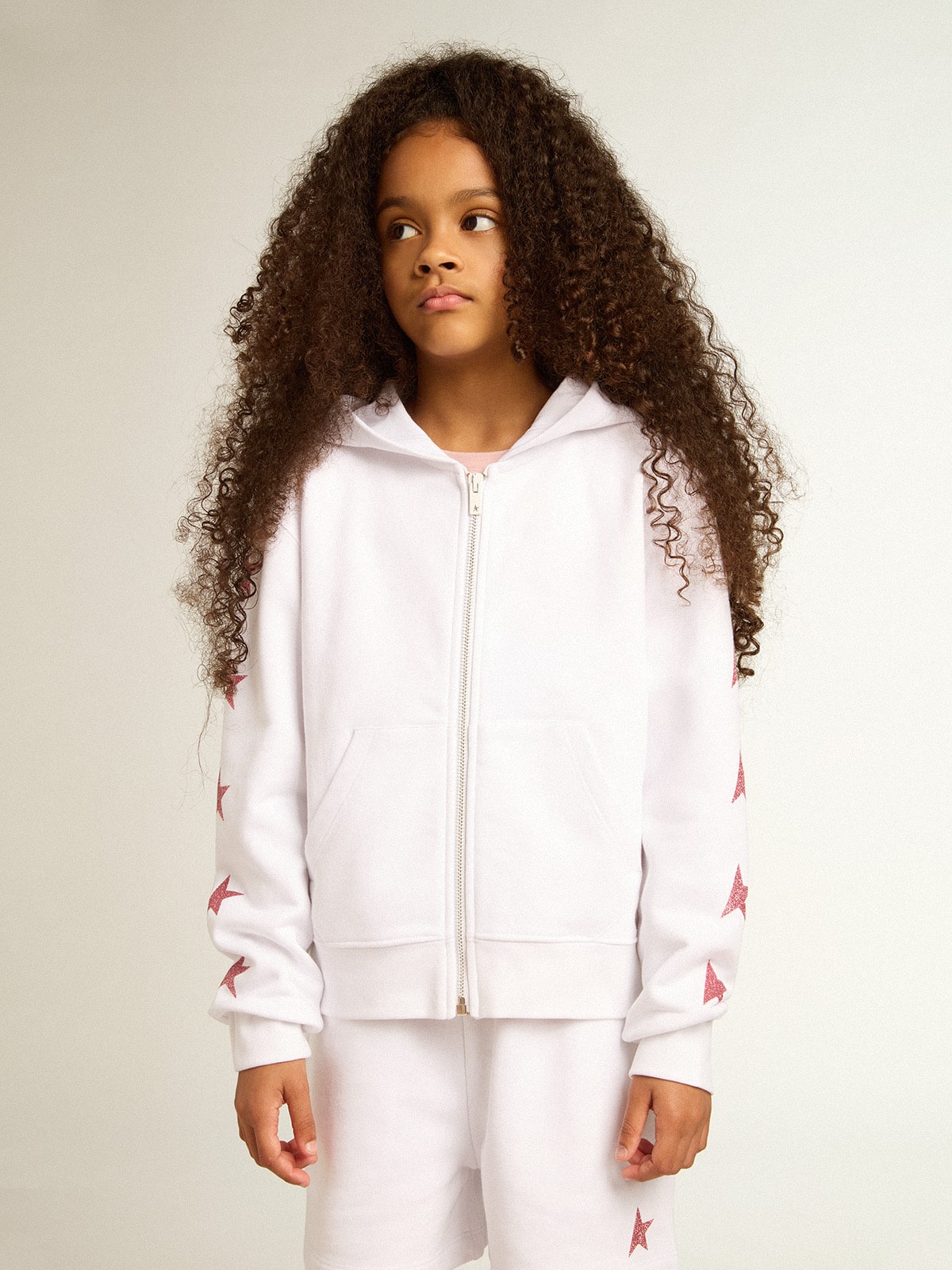 Girls’ zip-up sweatshirt in white with glitter stars on the sleeves