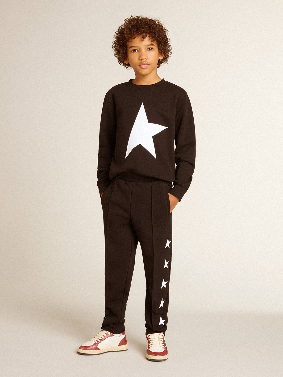 Boys’ black sweatshirt with white maxi star on the front