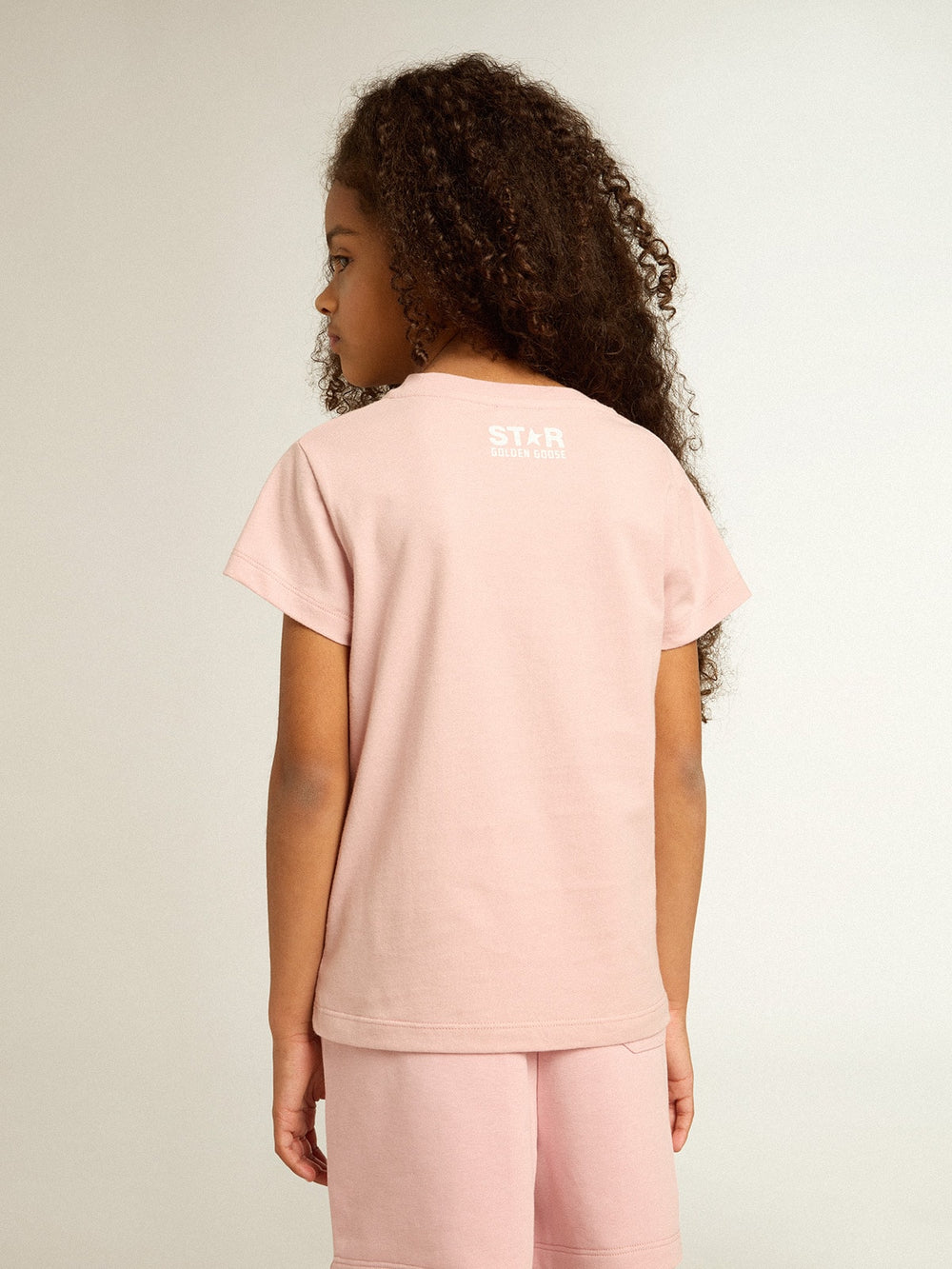 Girls’ pink T-shirt with white logo and maxi star