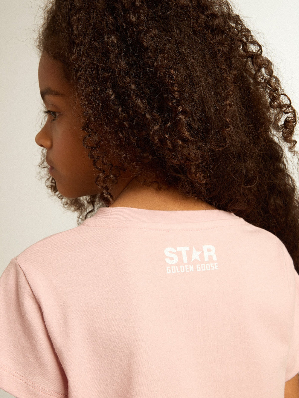 Girls’ pink T-shirt with white logo and maxi star