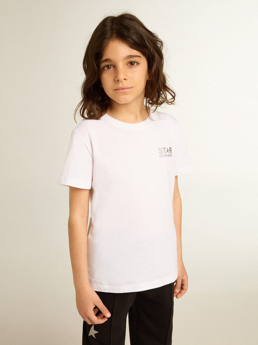 Girls’ white T-shirt with contrasting silver logo and star