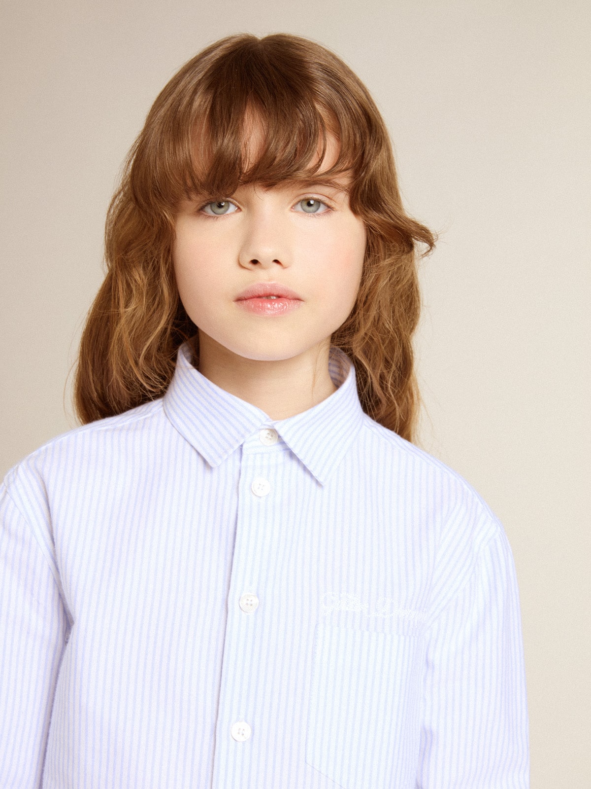 Girls’ striped shirt with embroidered lettering on the pocket