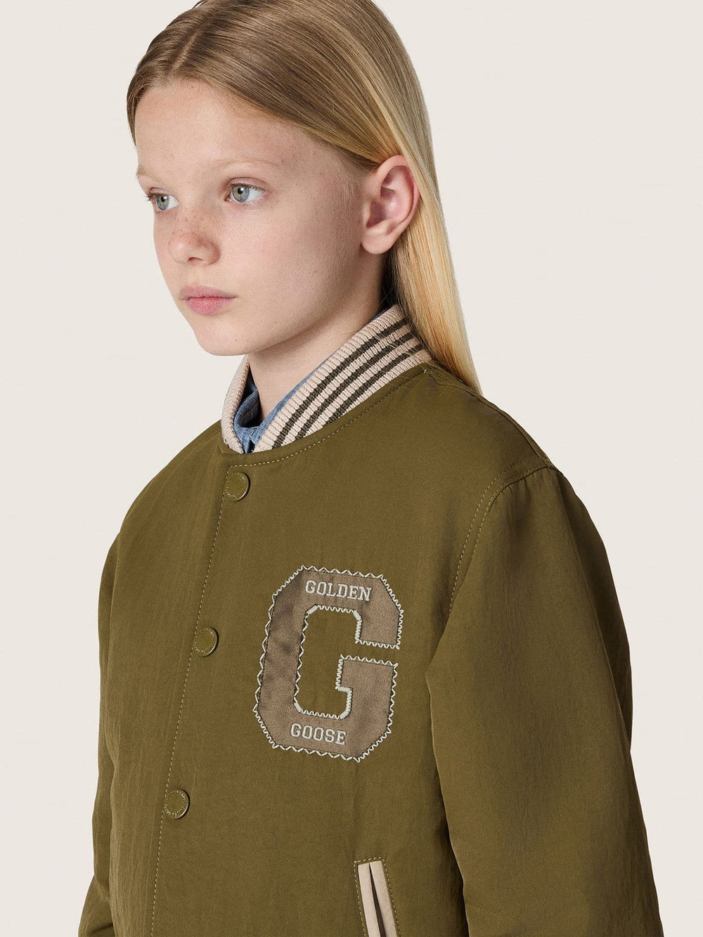 Journey unisex bomber jacket in military-green nylon twill with embroidered patch