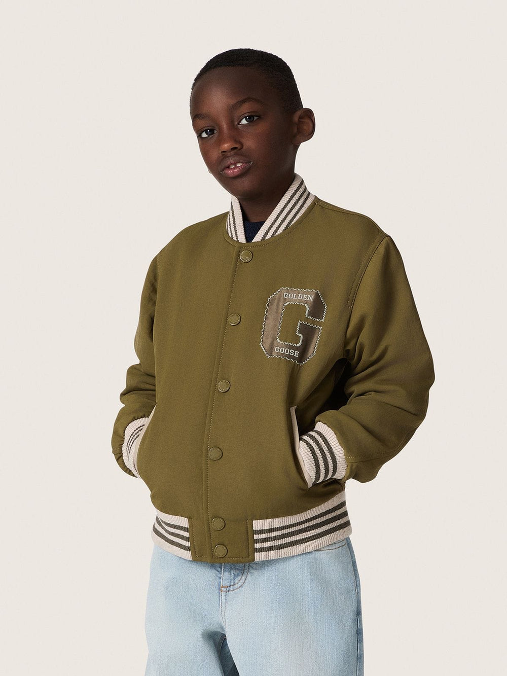 Journey unisex bomber jacket in military-green nylon twill with embroidered patch