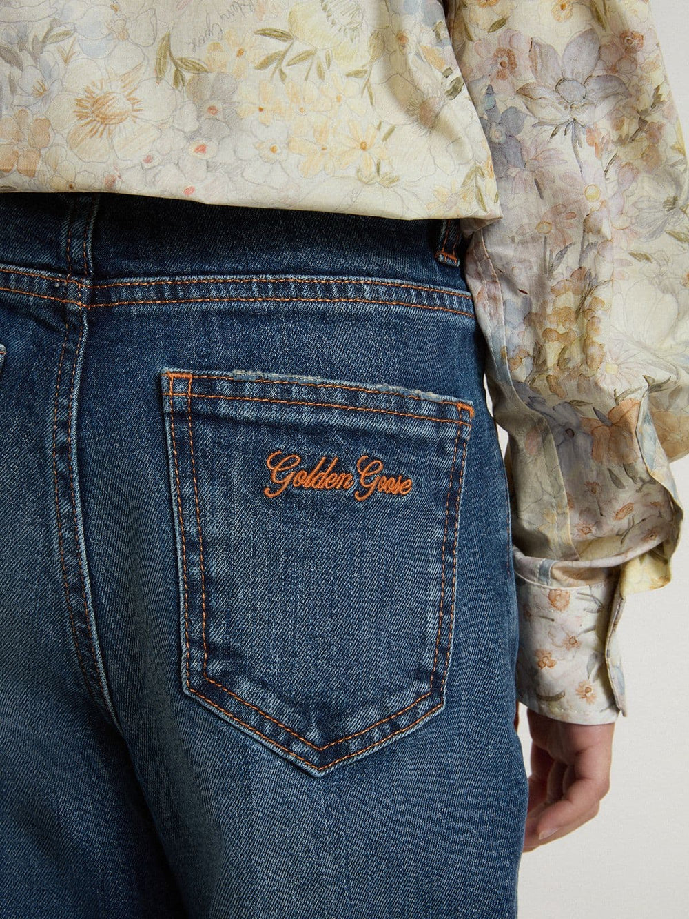 Girls' bootcut jeans with a medium wash and embroidery