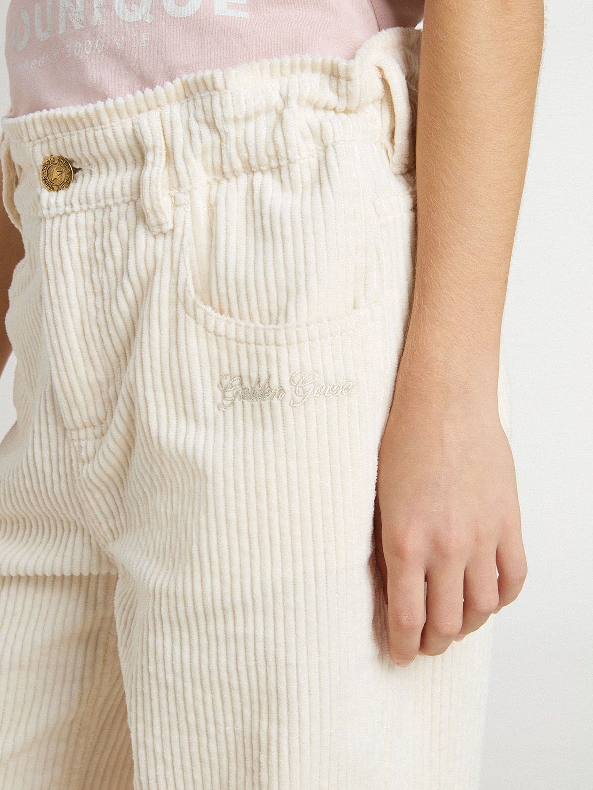 Girls’ wide ribbed cream-colored trousers with embroidery