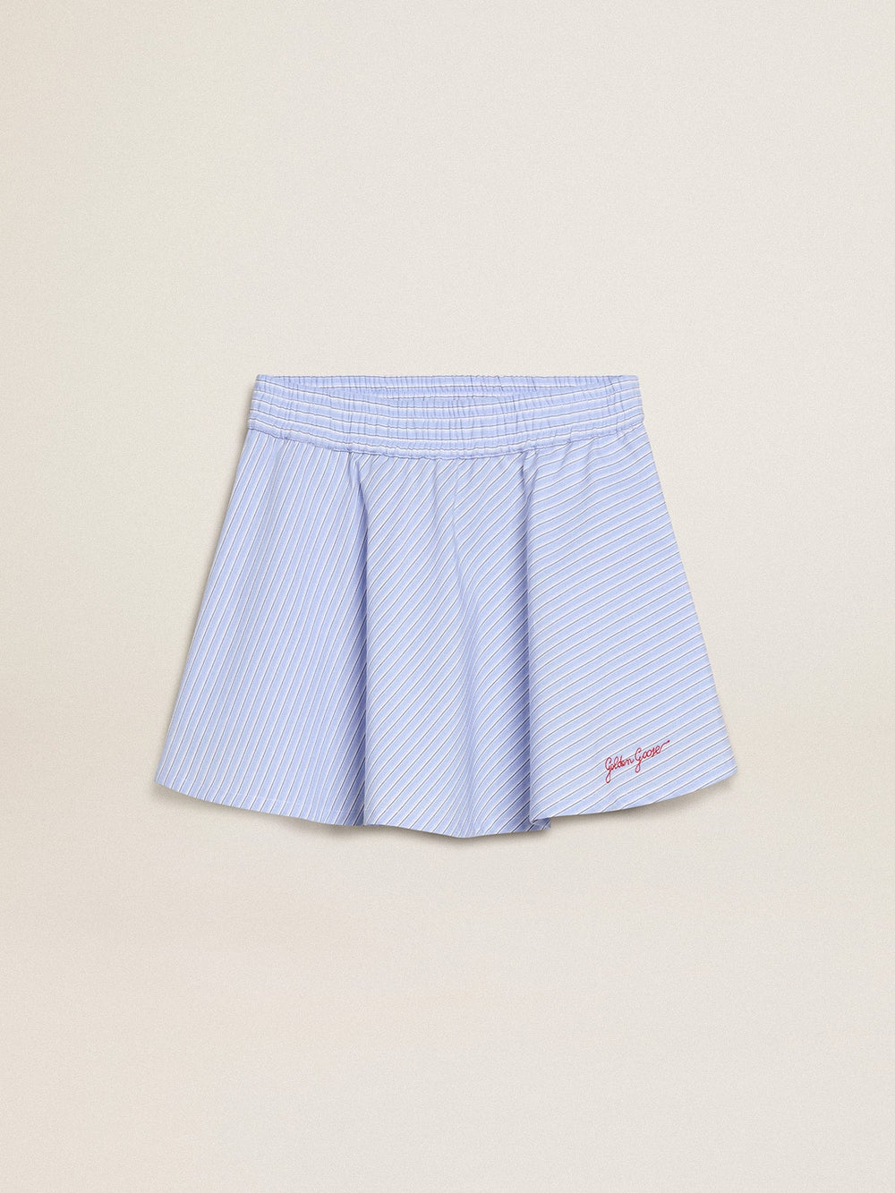 Girls' skirt with light blue stripes