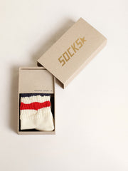 Socks in distressed-finish white cotton with red and navy stripes