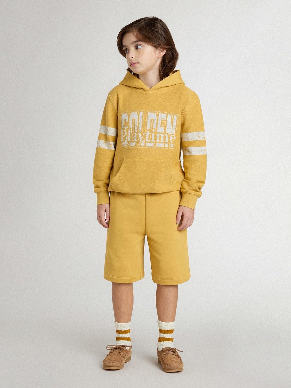 Kids jogging shorts in ochre yellow with embroidery