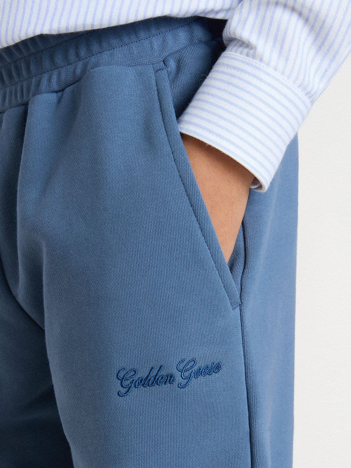 Kids’ blue joggers with embroidery