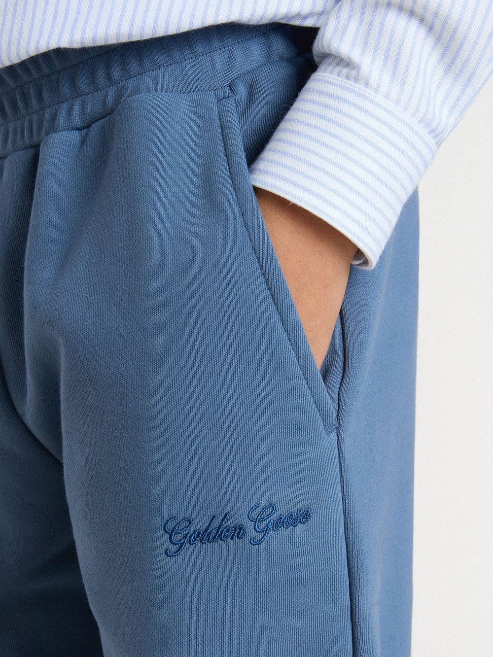 Kids’ blue joggers with embroidery