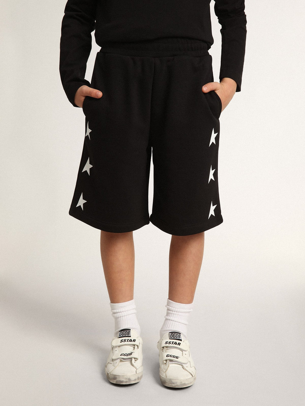 Boys’ black Bermuda shorts with white stars