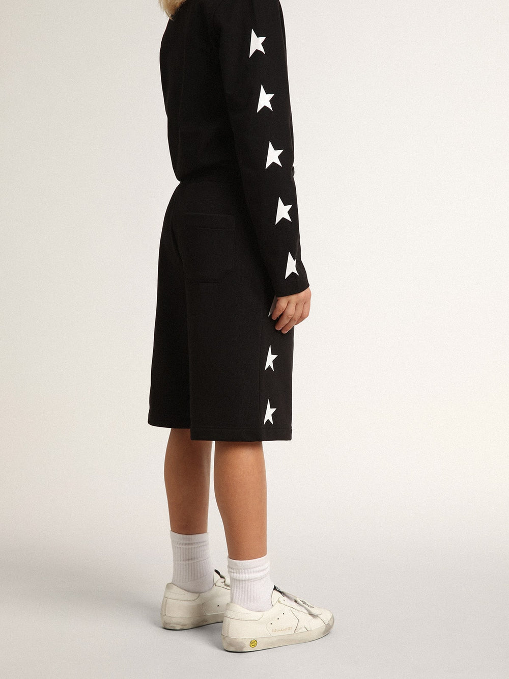 Boys’ black Bermuda shorts with white stars