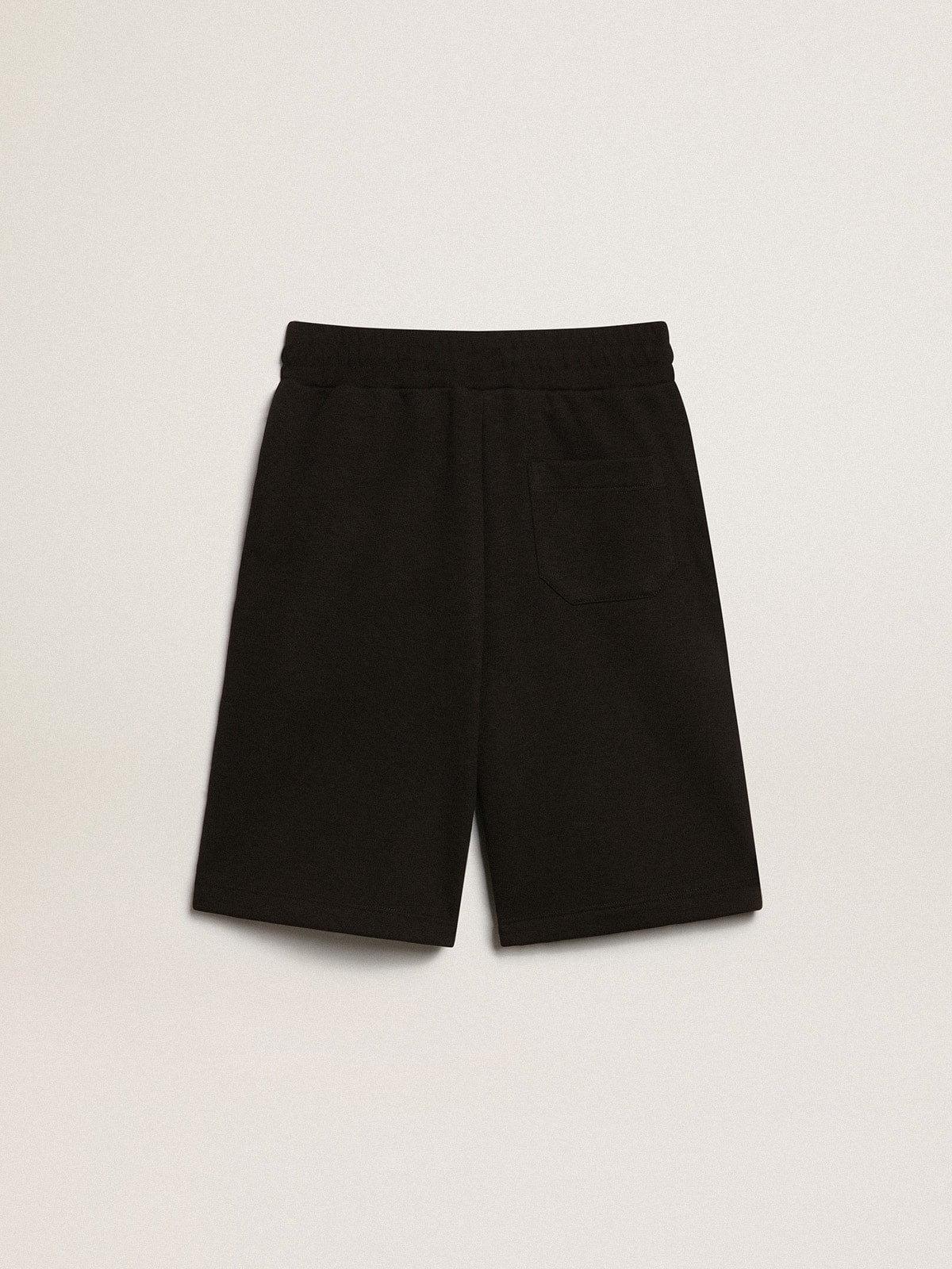 Boys’ black Bermuda shorts with white stars